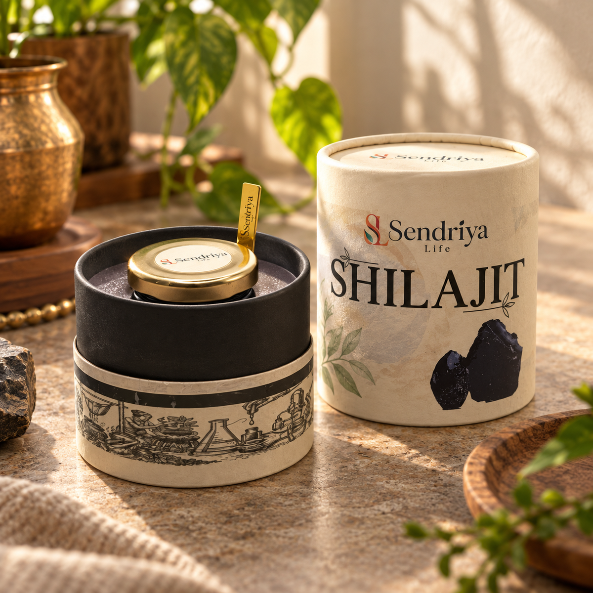 Styled photographic view of Sendriya Life Shilajit jar, spoon and outer packaging